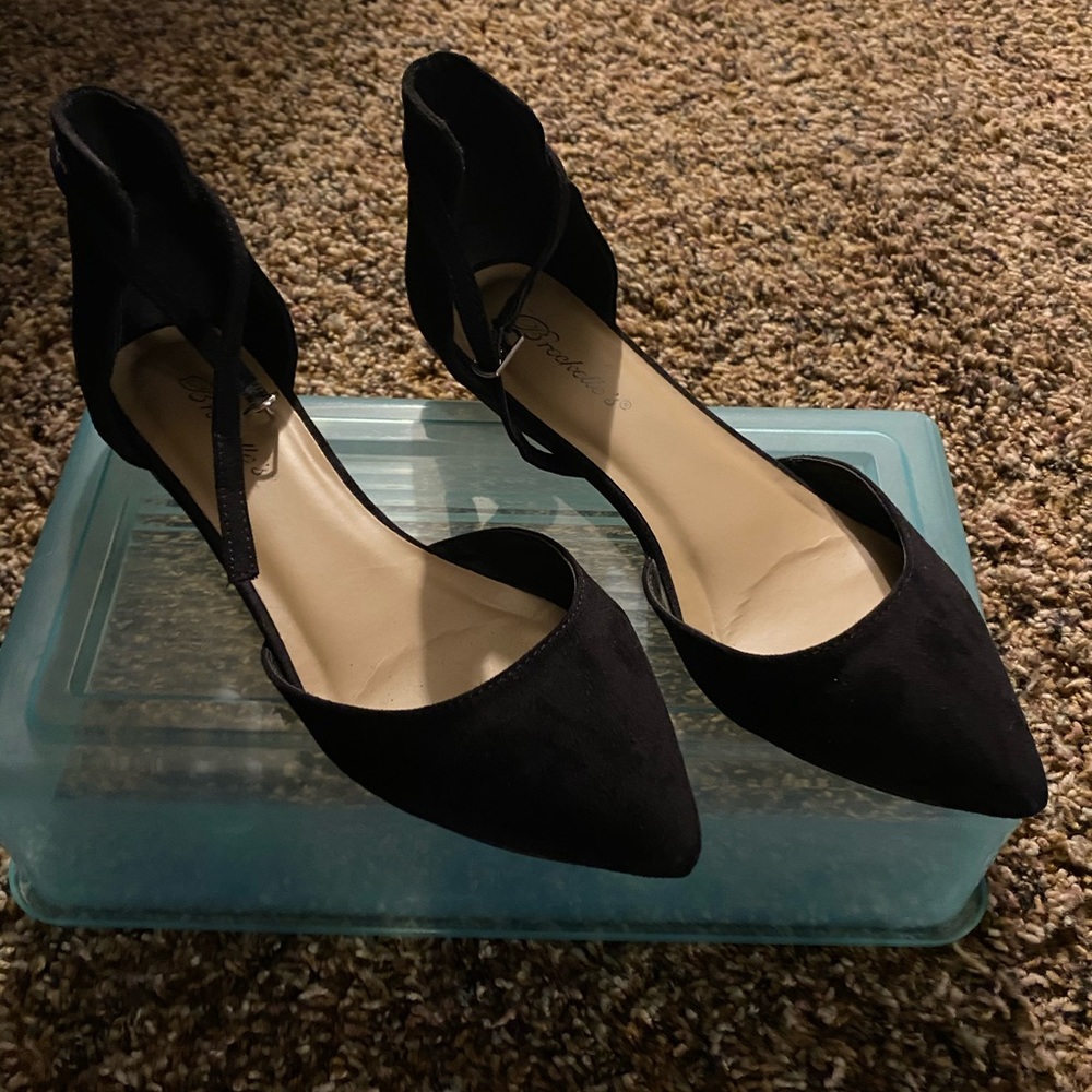 Black buckle flats